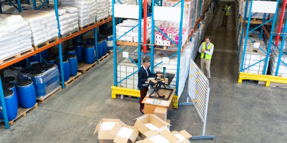 a picture of a large warehouse with lots of boxes inside